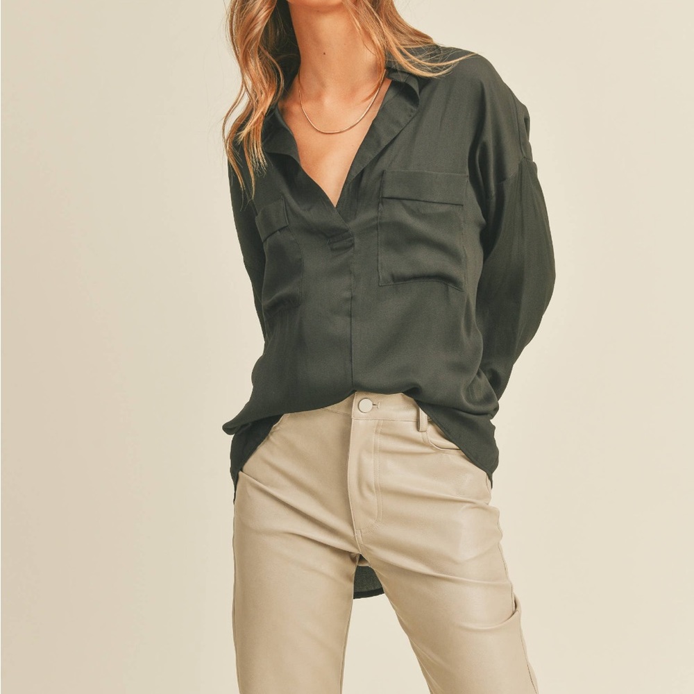 Black rayon blouse.